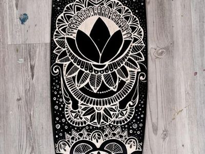 Custom engraved pintail longboard