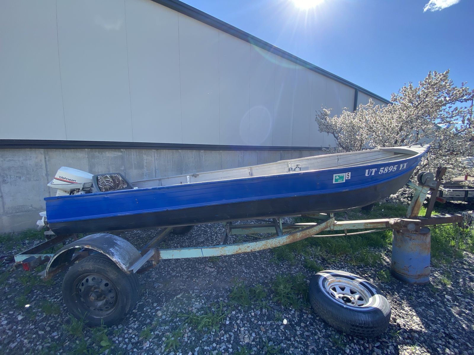 14 Foot aluminum boat with 15 horsepower Johnson OBO