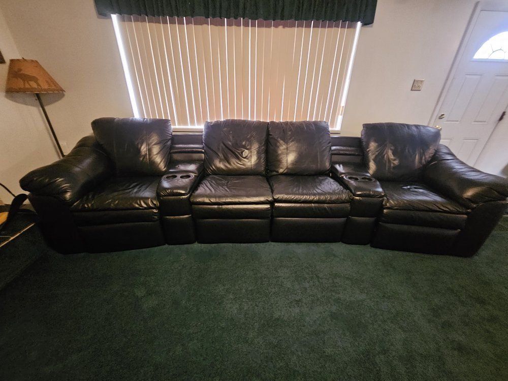 Black Leather Reclining Sectional Sofa with Built-in Cup Holders