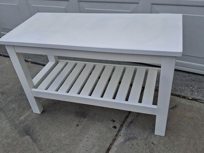 white bench with shoe rack