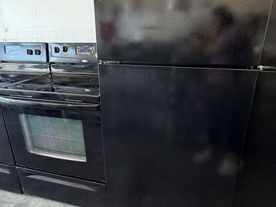 Whirlpool Black Top Freezer Refrigerator with Ice Maker (Used)