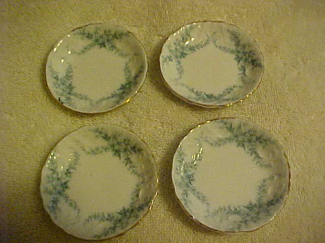 Pair of  Flow Blue 1905 butter pats....made in england