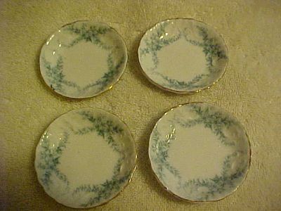Pair of Flow Blue 1905 butter pats....made in england