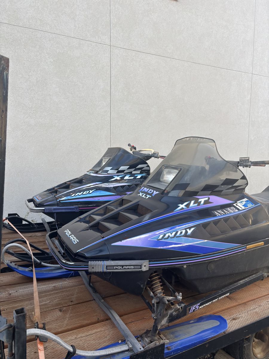 2 Polaris XLT Snowmobiles + 2-Place Trailer