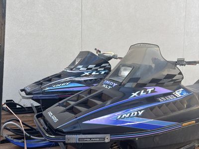 2 Polaris XLT Snowmobiles + 2-Place Trailer