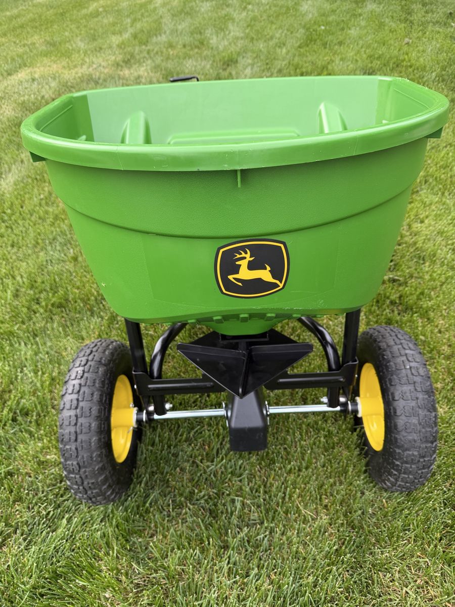 John Deere riding lawn mower fertilizer spreader.