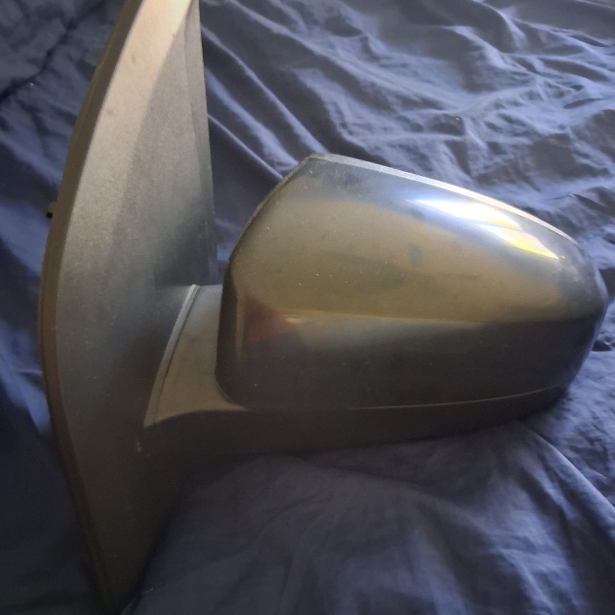 Manual drivers side door mirror.