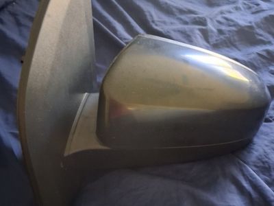 Manual drivers side door mirror.