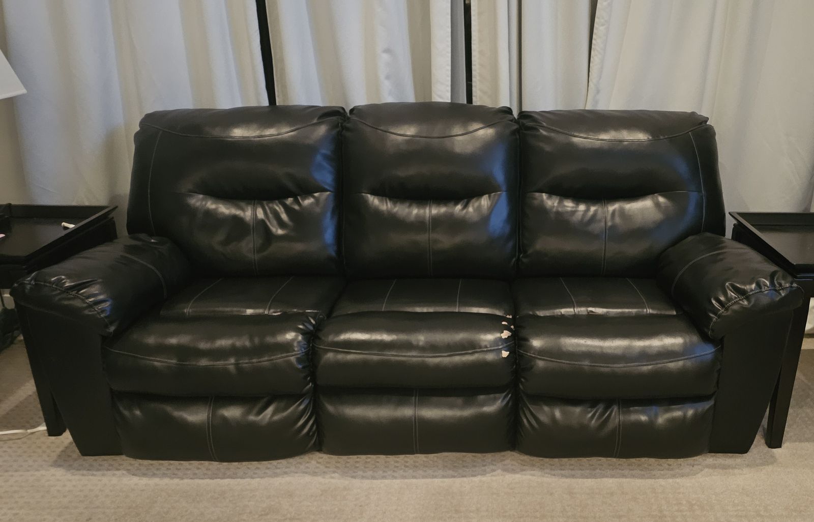 Kilzer Durablend Black Reclining Sofa.  It's a little beat up, but still a great couch!