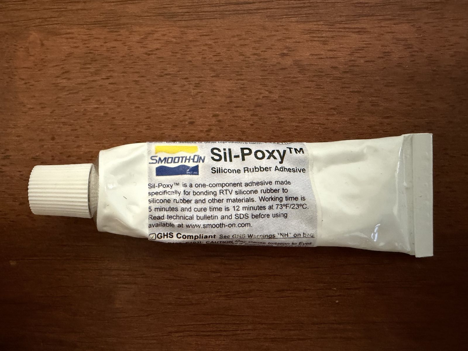 Silicone rubber adhesive
