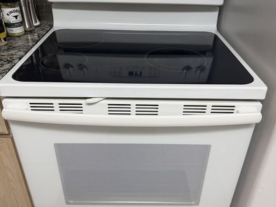 GE White Electric Range with Glass Cooktop