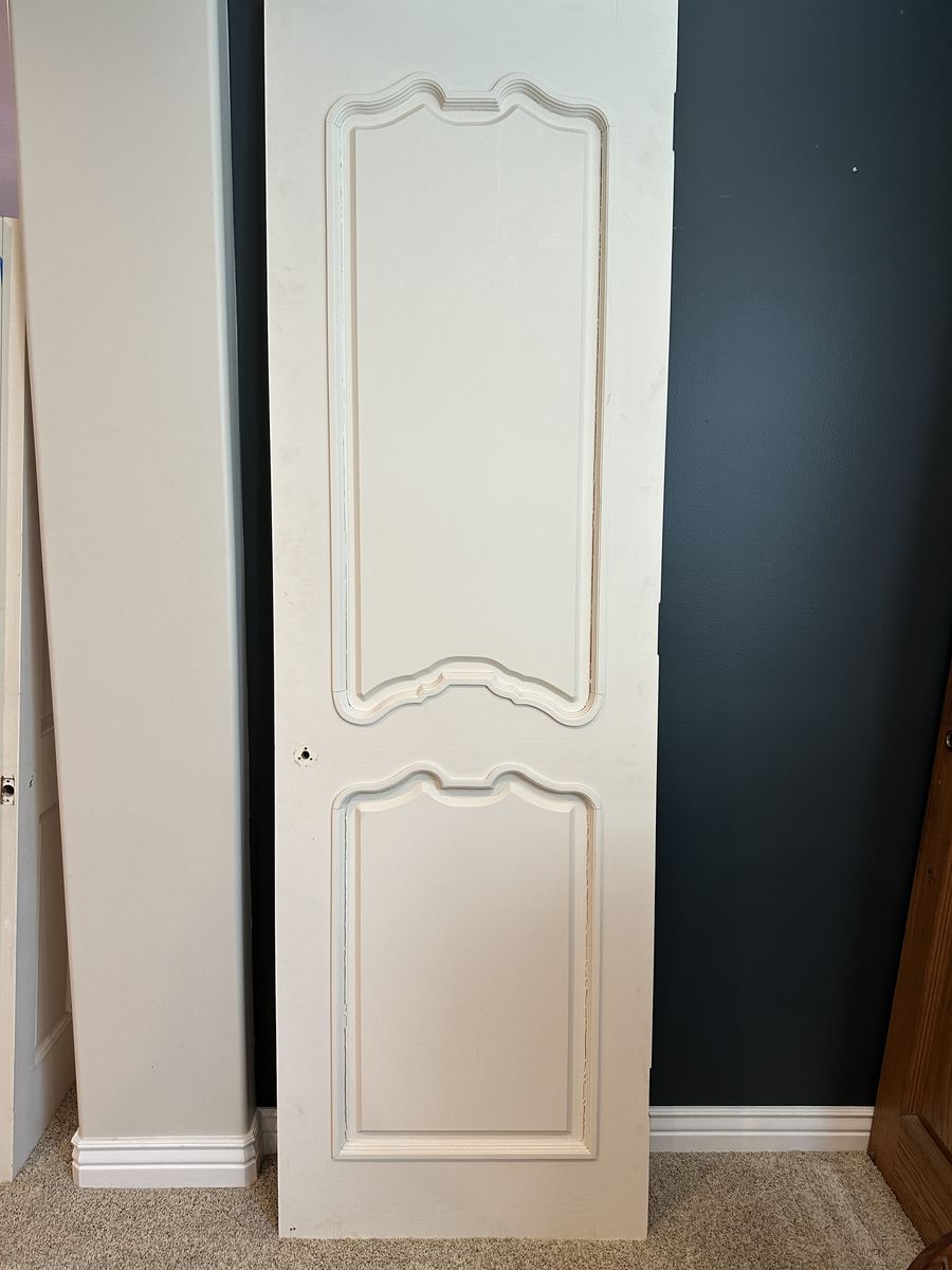 Quality solid wood interior doors removed during a remodel. These are not hollow-core or MDF—they are solid wood construction.