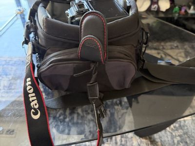 Canon EOS DSLR Camera with Two Lenses and Lowepro Bag