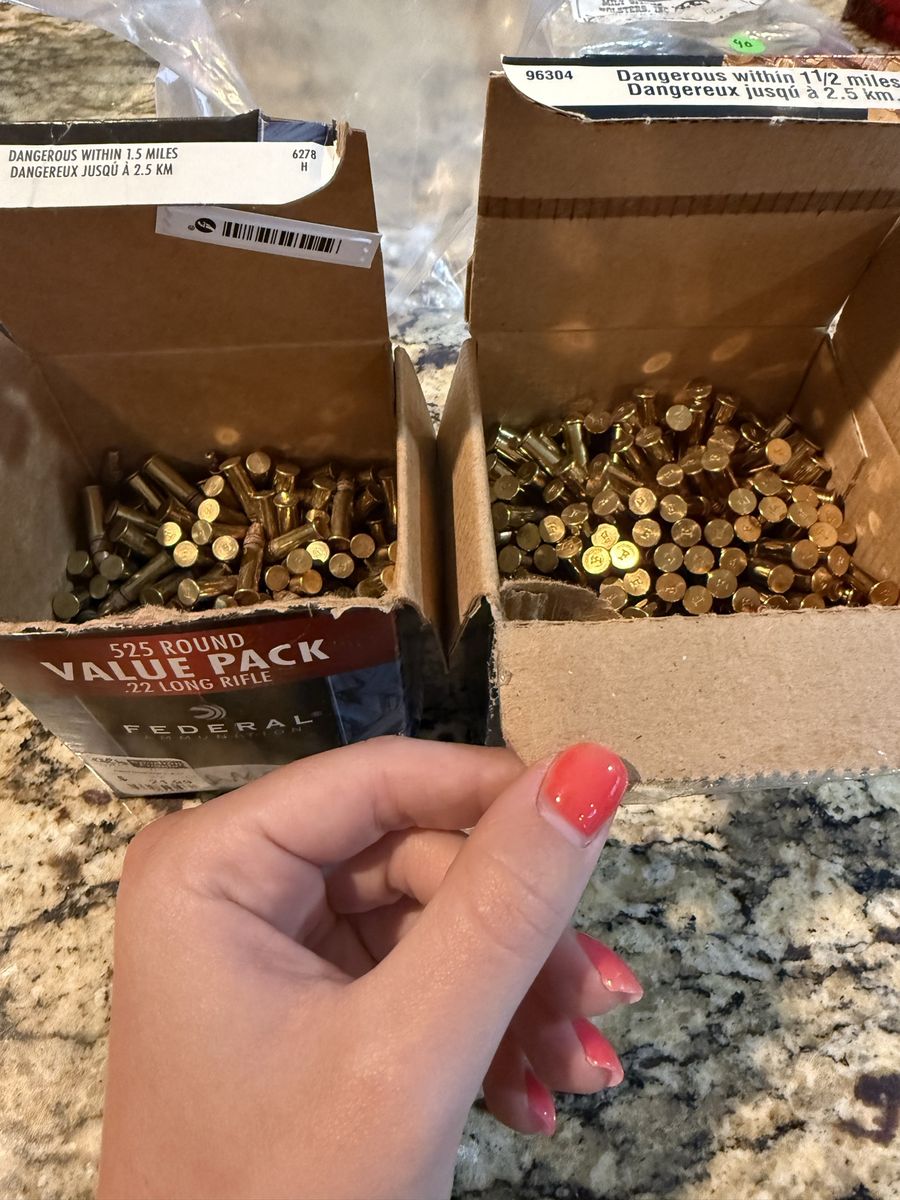 Two mostly full boxes of Federal .22 ammo