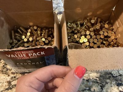 Two mostly full boxes of Federal .22 ammo