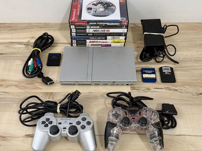 PS2 Slim Bundle W/ 8 Games