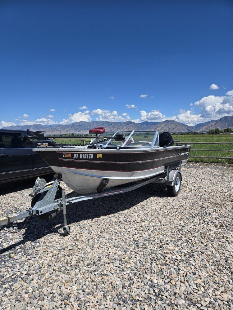 Spectrum Aluminum Fishing Boat with Mercury 150 Outboard and Trailer