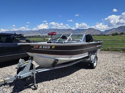 Spectrum Aluminum Fishing Boat with Mercury 150 Outboard and Trailer