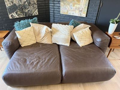 Brown leather couch and chair