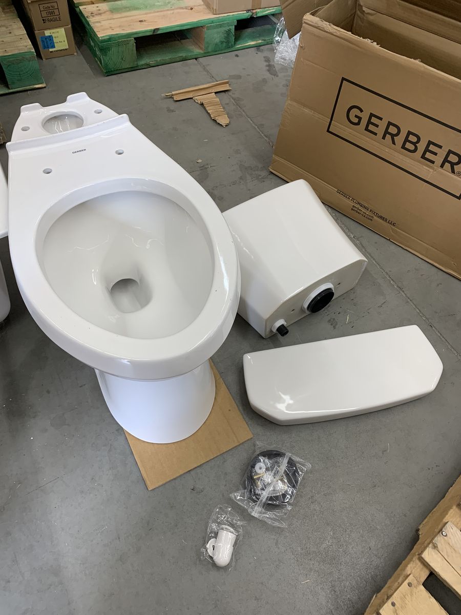 Gerber Viper 2-Piece 1.28 GPF Gravity Flush Compact Elongated ADA Toilet in White with Slow Close Seat