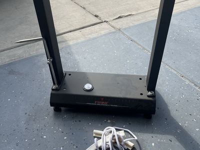 Tusk wheel balancing stand