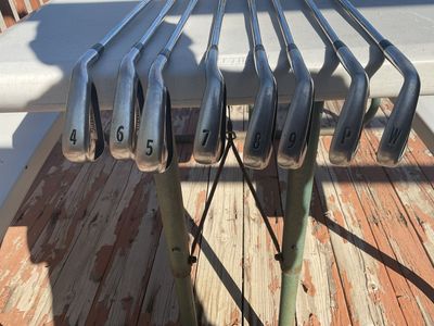 Titleist AP1 714 irons 4- PW+48 PW Steel stiff.