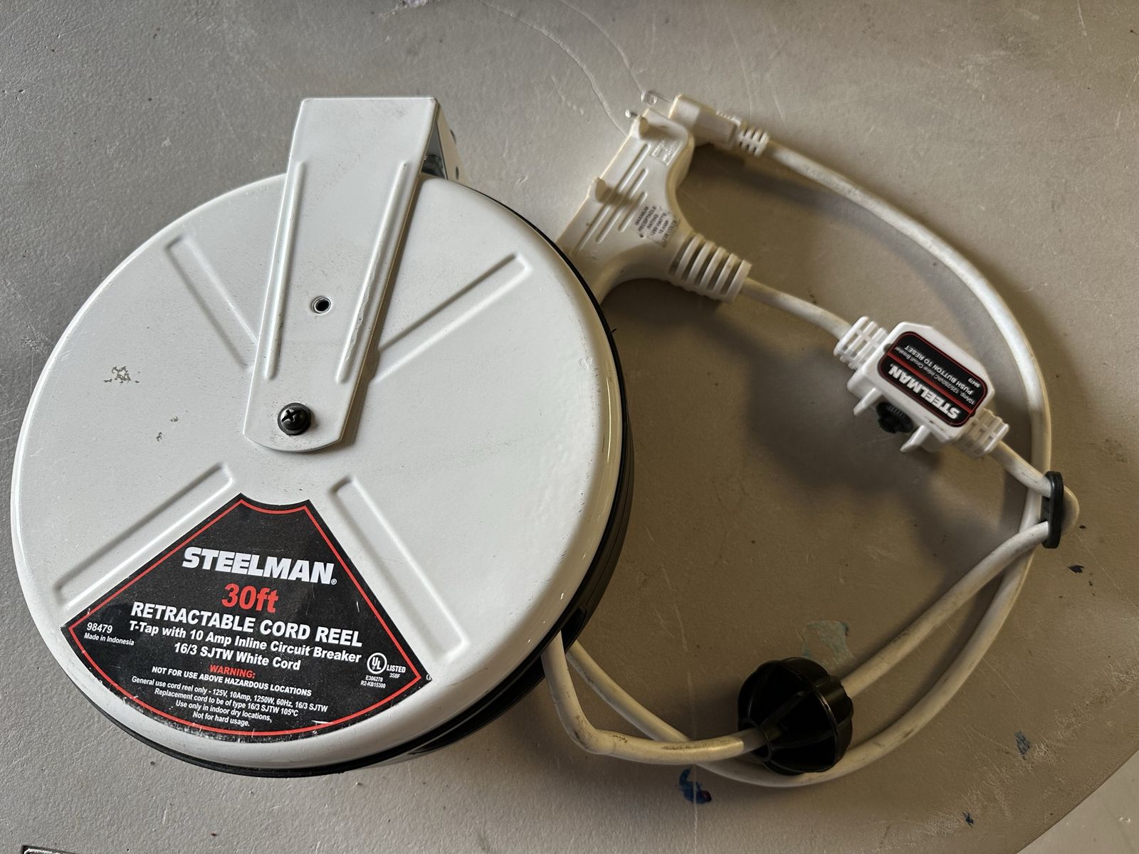 30-Foot Retractable Cord Reel with Triple Tap and 10A Inline Circuit Breaker