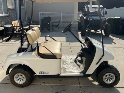 EZ GO TXT 48 Electric Golf Cart with full enclosure.