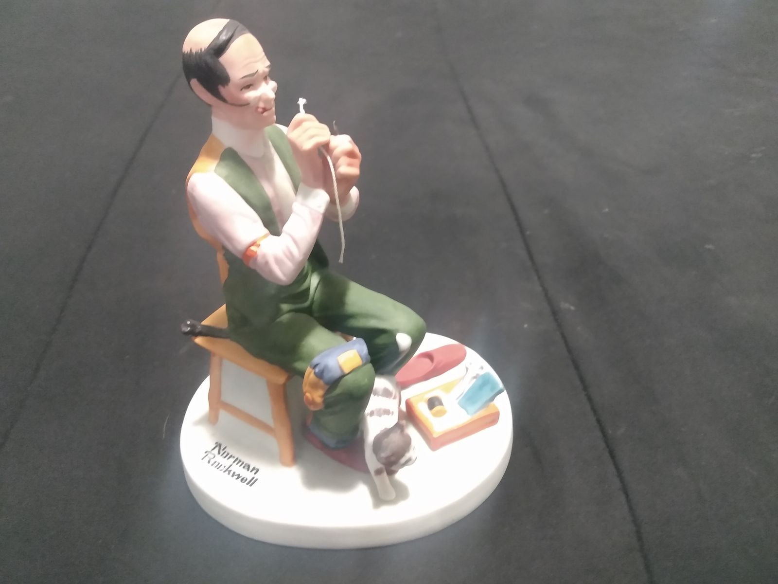 The Danbury Mint Norman Rockwell "Man Threading a Needle" porcelain statue figurine collectible