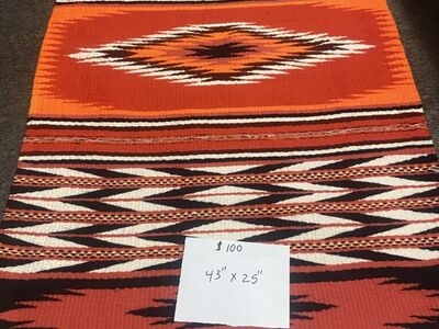 3 wool rug with a geometric design