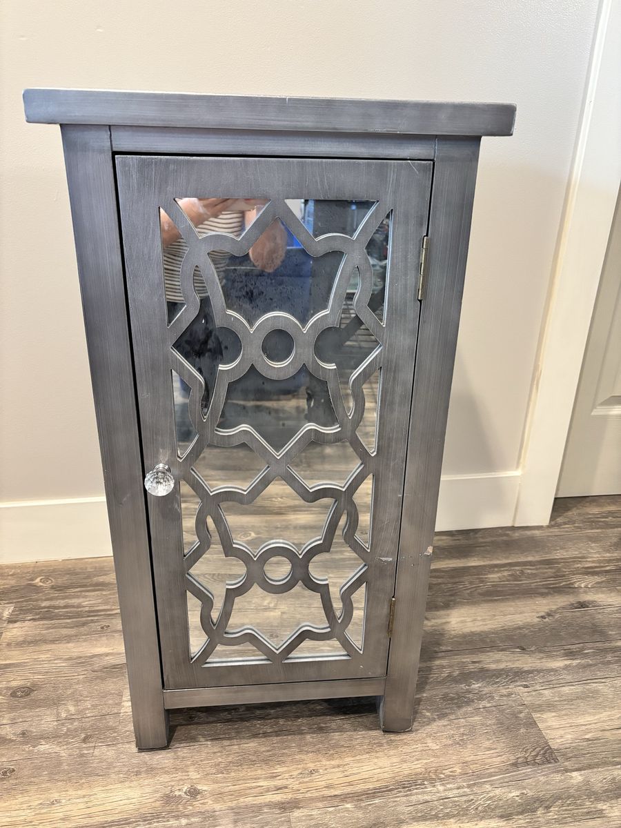 Silver Accent Cabinet with Mirrored Cutout Door and Interior Shelf