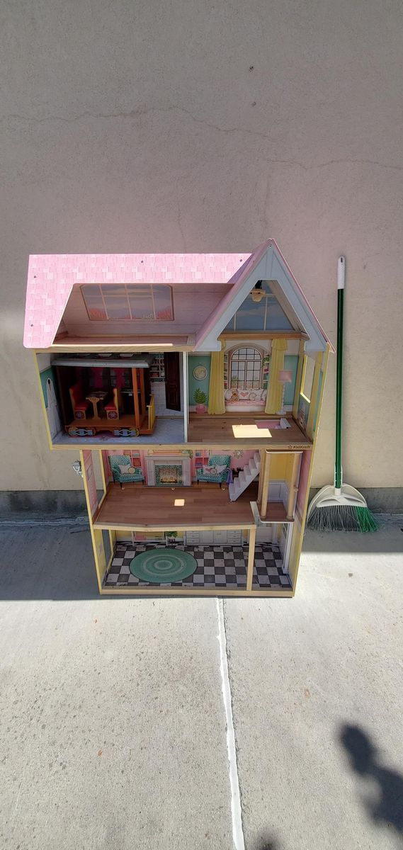 Wooden KidKraft dollhouse