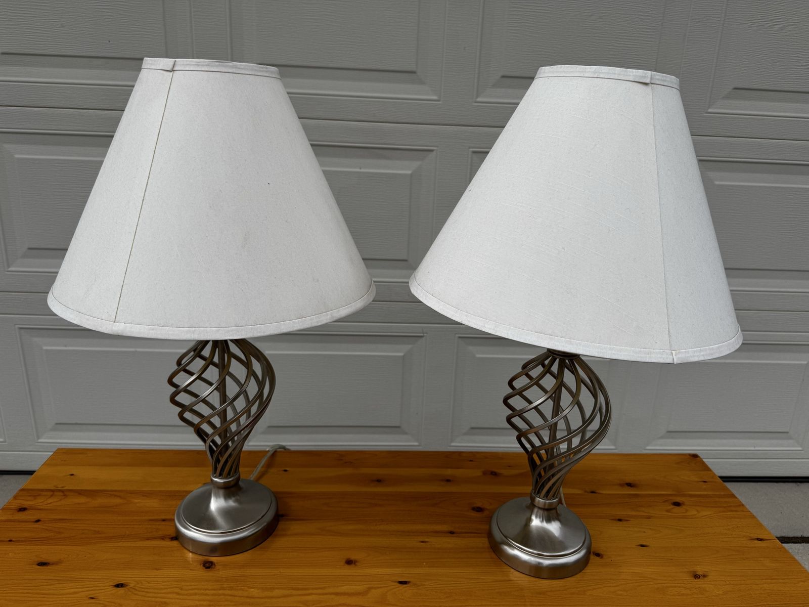 Pair of Modern Brushed Nickel Swirl Design Table Lamps with White Fabric Shades