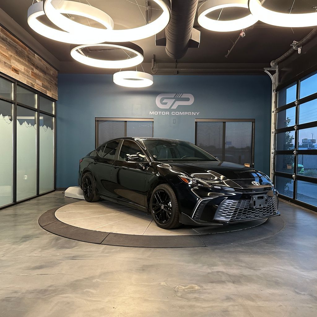 2025 Toyota Camry SE — rebuilt & branded title, 20% below market