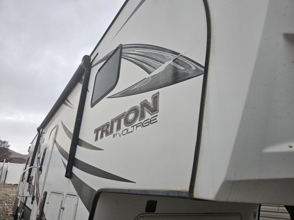 5th Wheel - Triton by Voltage - Travel Trailer Toy Hauler - 2016 Keystone (Model 3451)