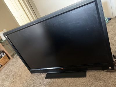 Vizio Flat Screen TV with Roku streaming stick and Remotes