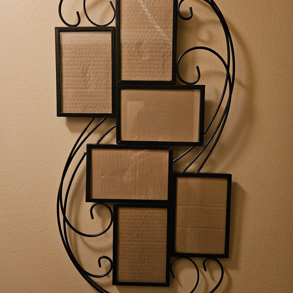Black metal wall hanging mutiframes