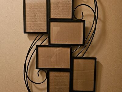 Black metal wall hanging mutiframes