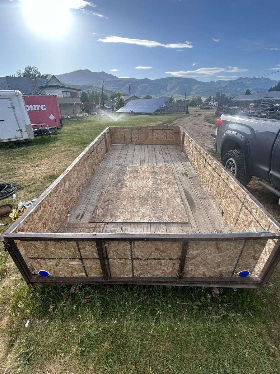 Utility Trailer - Flatbed with High Sides, Single Axle, Ready for Hauling