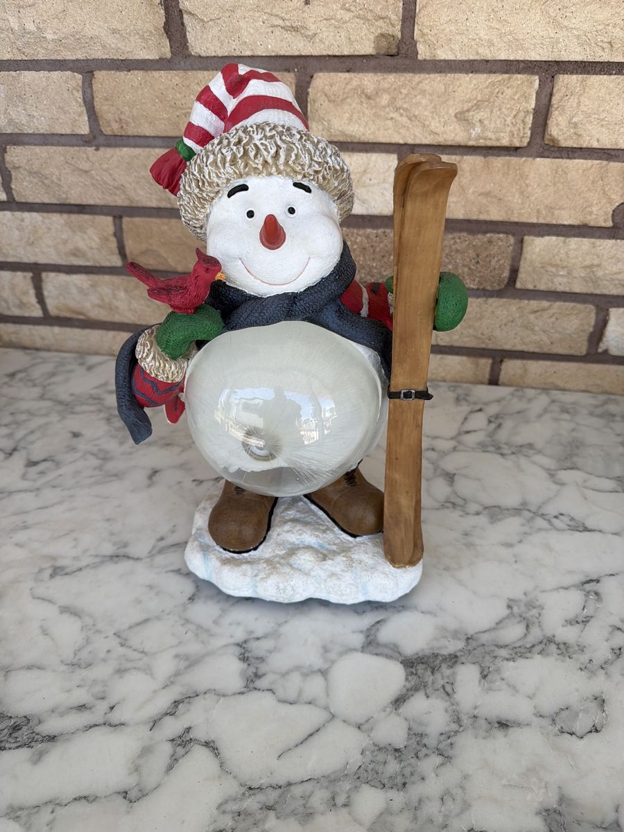 Charming Snowman Skiing Decor with Clear Globe & Cardinal - Festive Winter Figurine