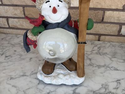 Charming Snowman Skiing Decor with Clear Globe & Cardinal - Festive Winter Figurine