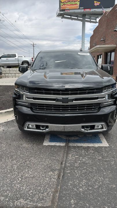 2020 Chevrolet Silverado 1500 High Country — rebuilt & branded title, 17% below market