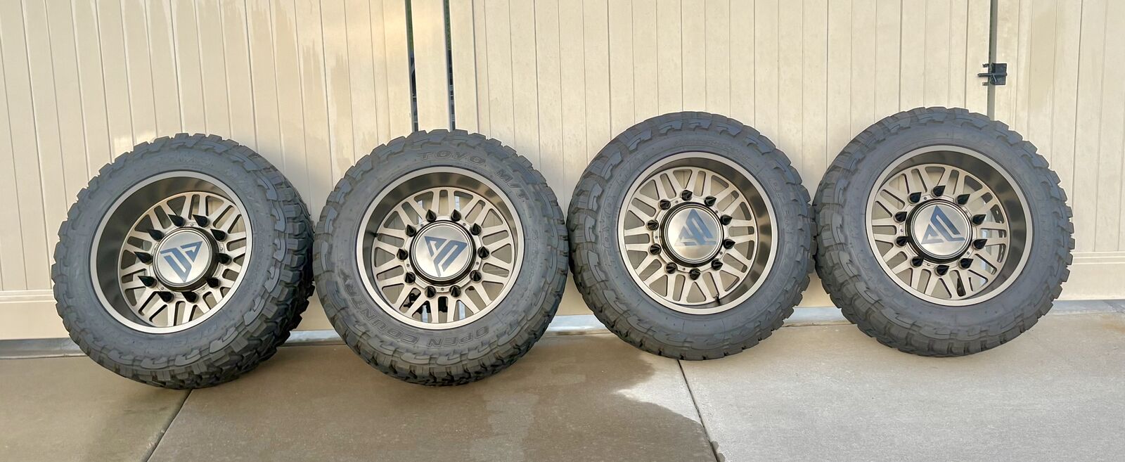 Set of DDC Forged Super Single 22x11 (-28 offset) Wheels and Toyo Open Country M/T Tires 8x170