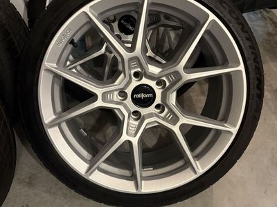 Rotiform kps wheels AND continental extreme contact sport plus all season tires.