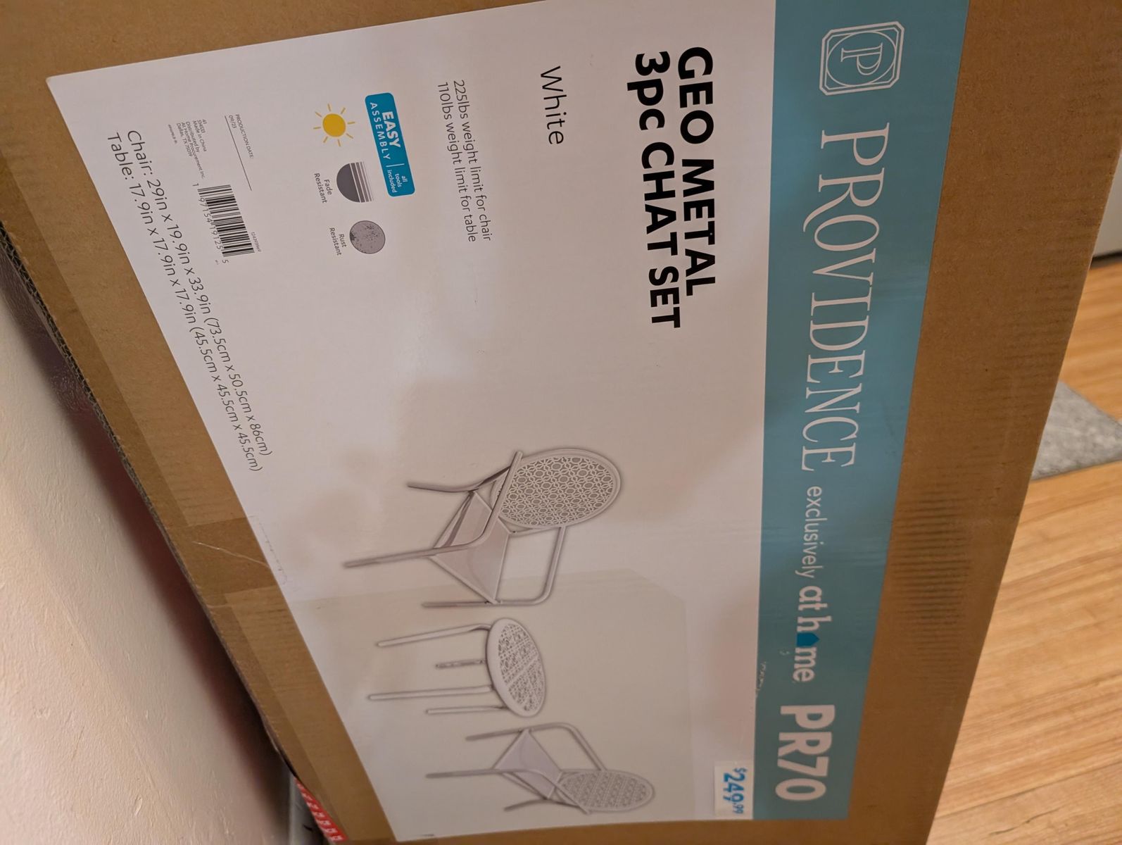 White table and two chairs