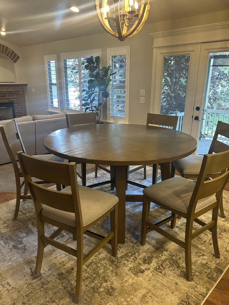 6 ft round dining table with six chairs
