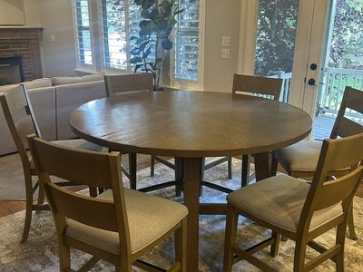 6 ft round dining table with six chairs