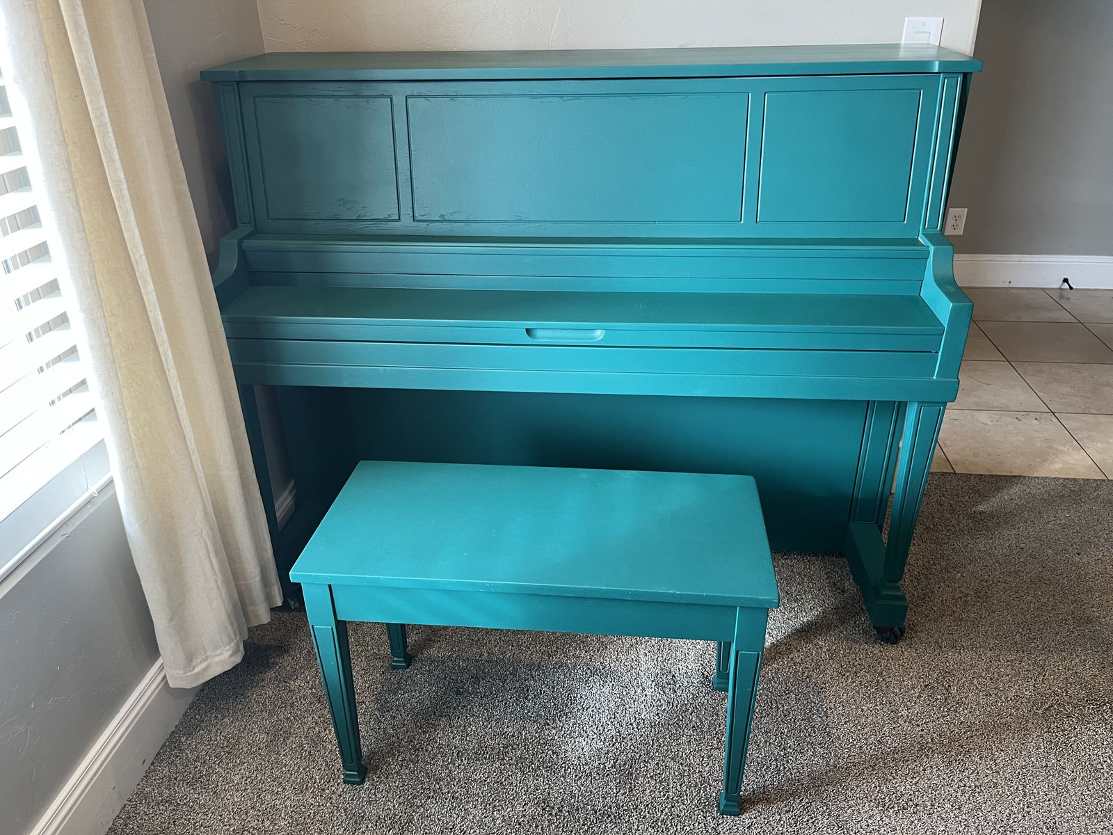 Teal green piano