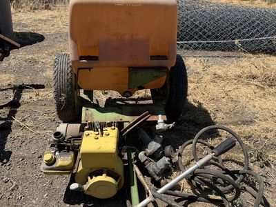 Old John Deere tank sprayer