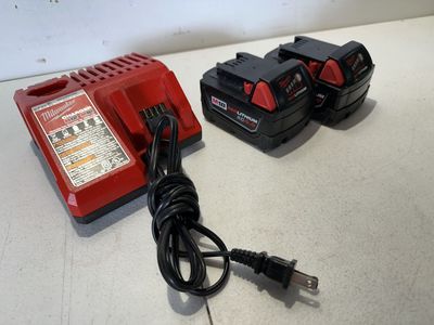 Milwaukee M18 (2) XC5.0 Batteries And Charger